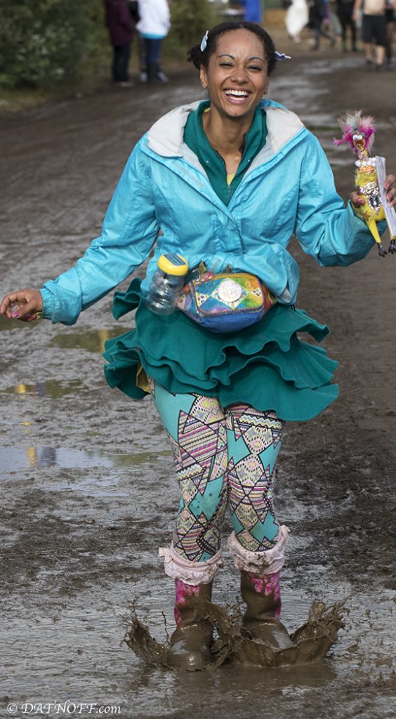 Woman in rain boots at Oregon Country Fair