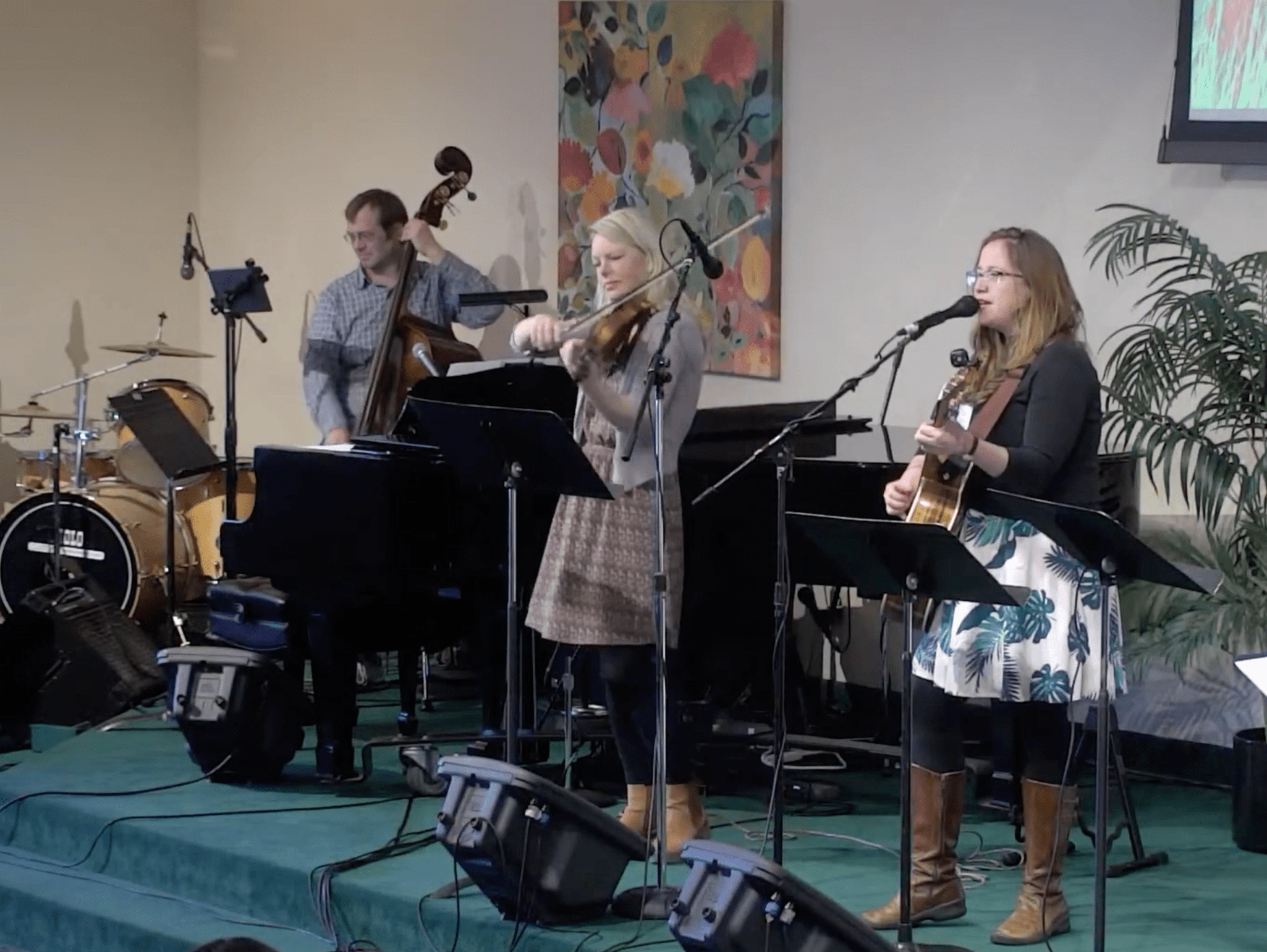 KT & The Love Notes perform on stage.